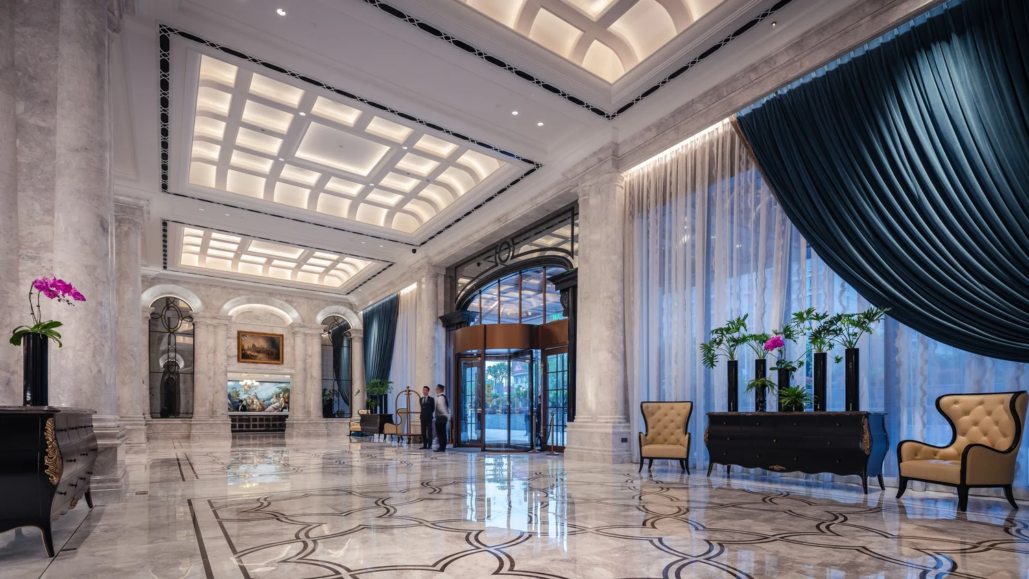 Elegant hotel lobby with high ceilings and opulent decor